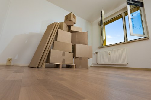 Professional office removals team handling workspace furniture in Dollishill