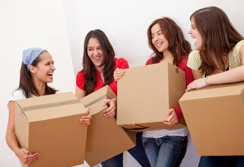 Packed moving boxes for local student storage in a Dollishill home
