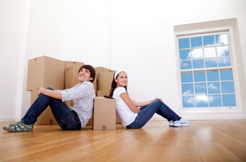 Furniture and packed boxes ready for small removals in Dollishill